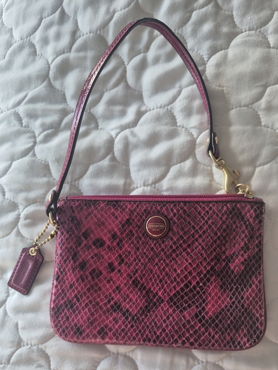 Coach Handbags - Coach Pink Snake-Print Wristlet with Gold Accents
